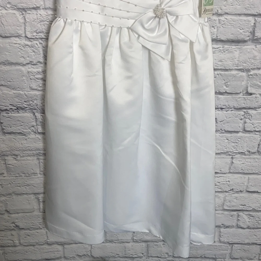 Bonnie Jean Girl's 12 1/2 White Pearl and Bow Layered Formal Dress
